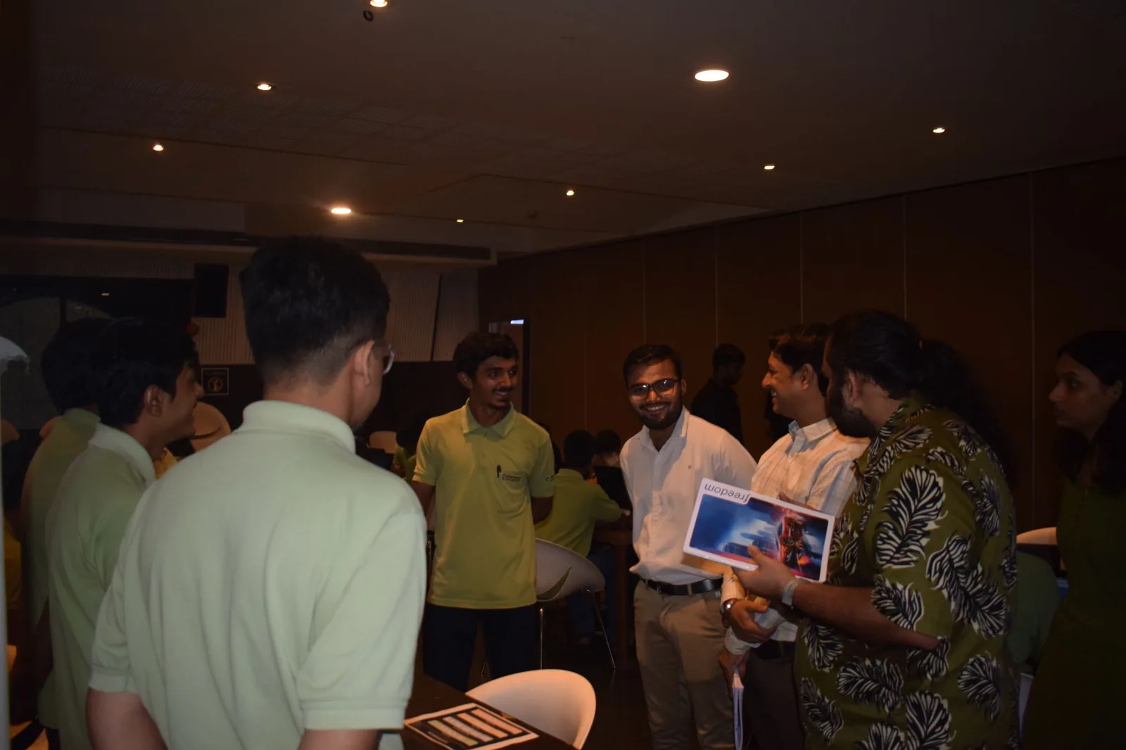 Jaydeep Adesara in conversation with participants during an event